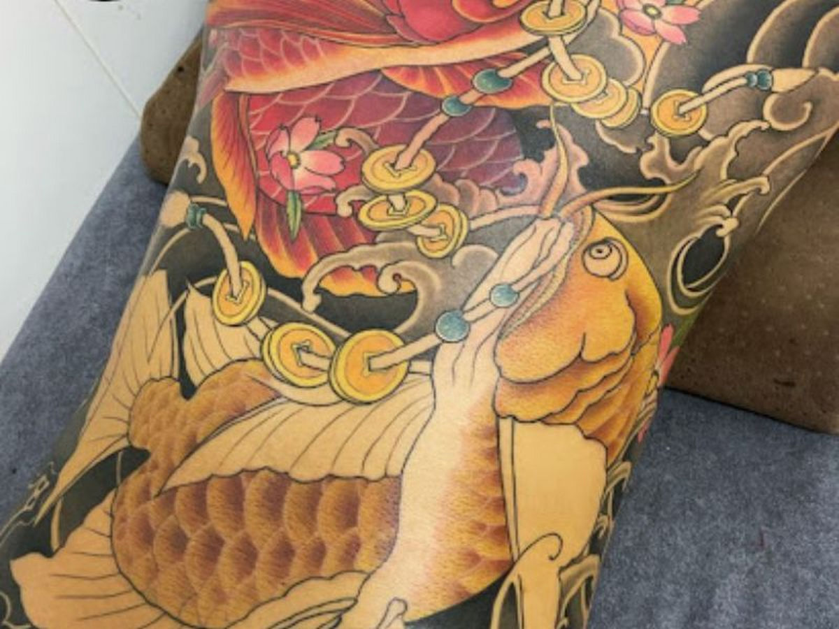  Mẫu tattoo cá rồng kín lưng sẽ tạo nên một bức tranh sống động