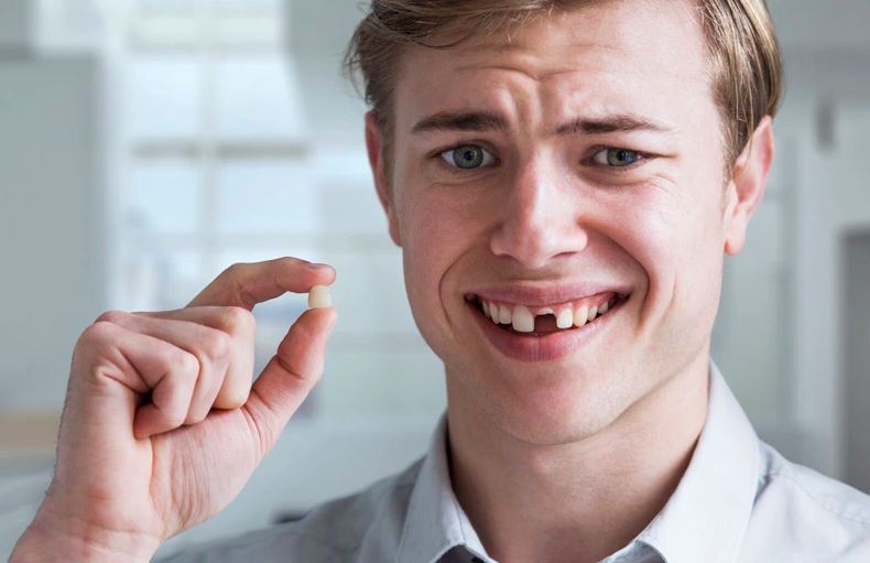 Chiêm bao thấy răng rụng hàm nhắc nhở bạn tránh xung đột không đáng có